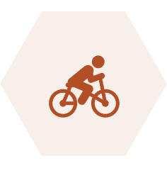 Cyclist icon on black hexagon background